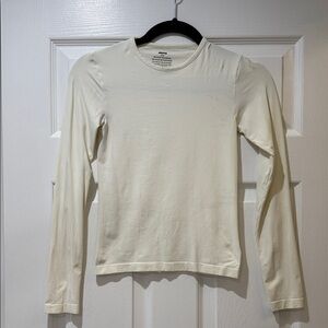 Cream Long Sleeve Top. Skims size medium